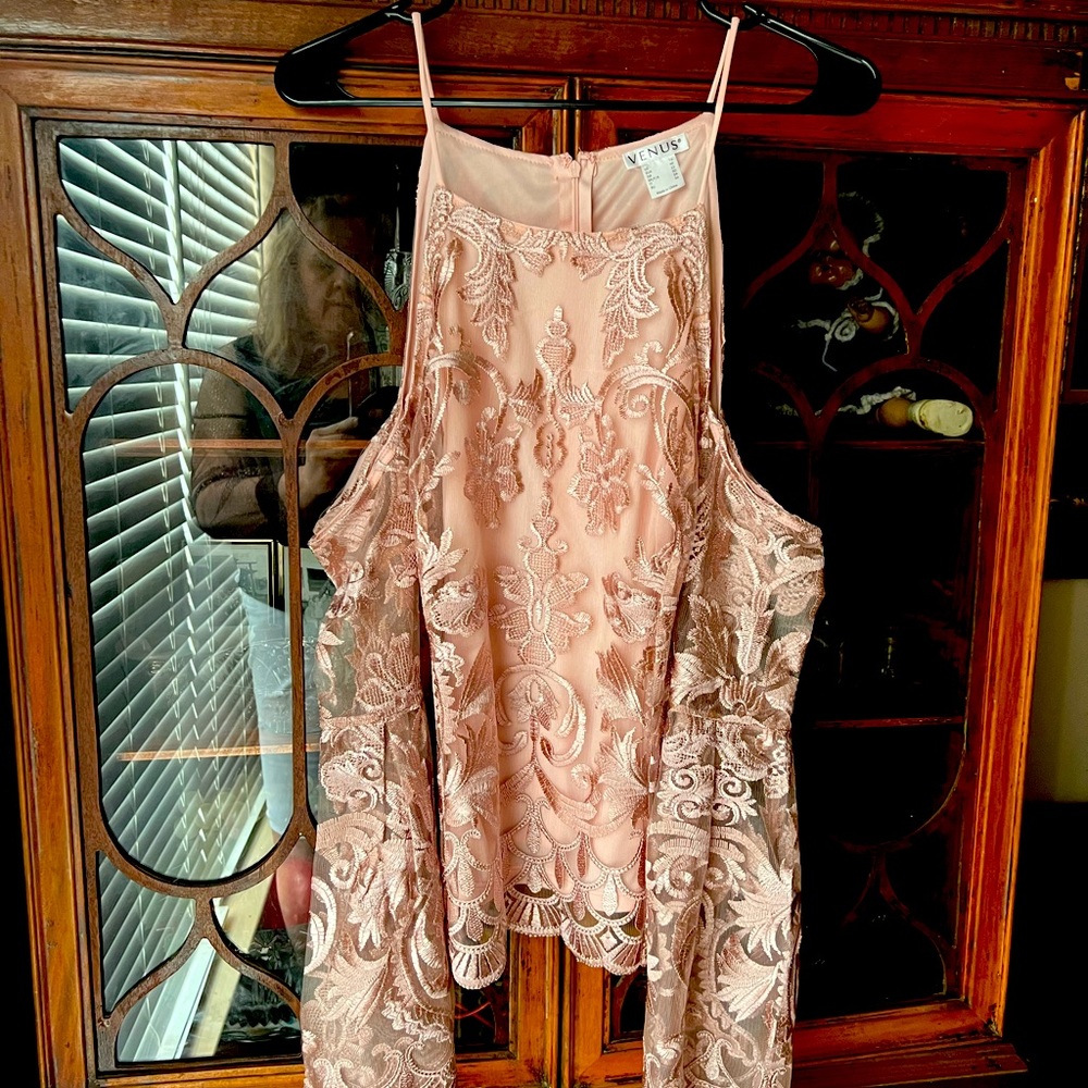 Beautiful pink lace covered cold shoulder shirt. Worn once.